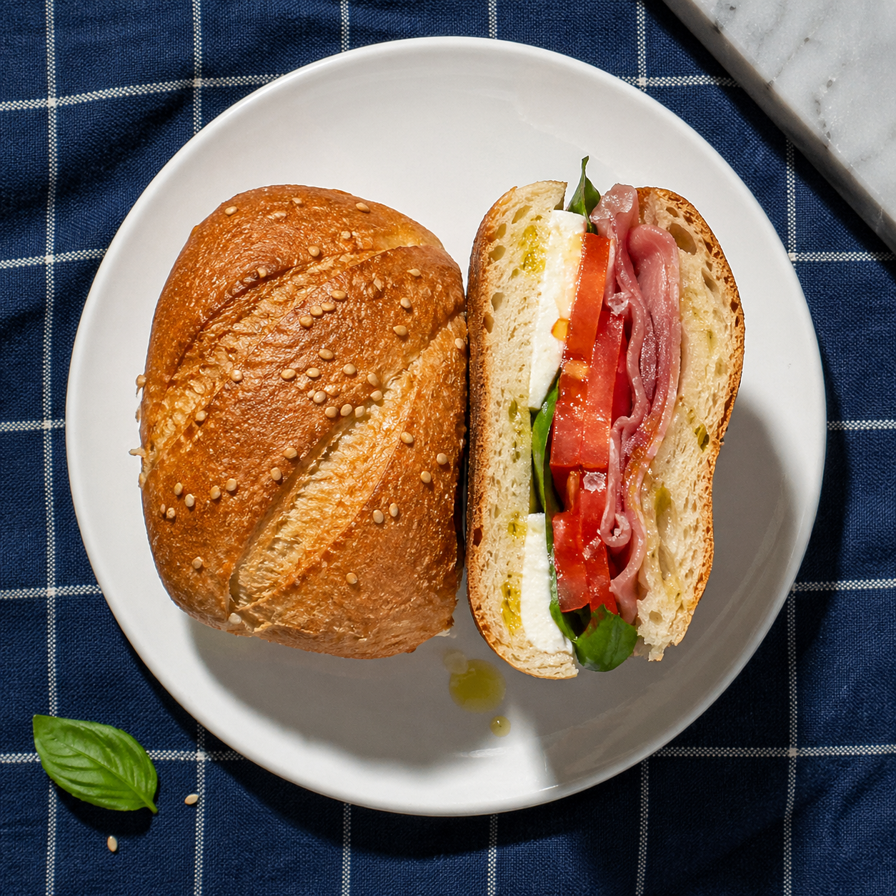 Caprese panino with prosciutto crudo