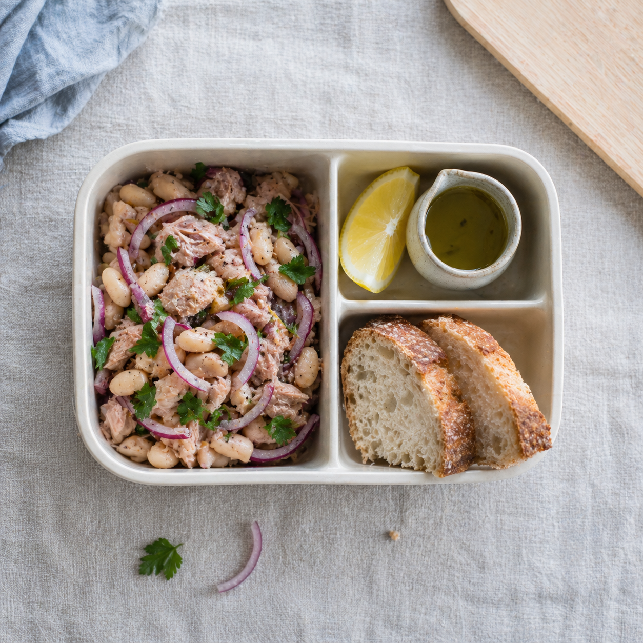 Tuna, cannellini, and red onion salad with rustic bread